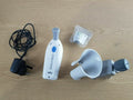 zalviso therapies module with power adapter and bedside cradle0
