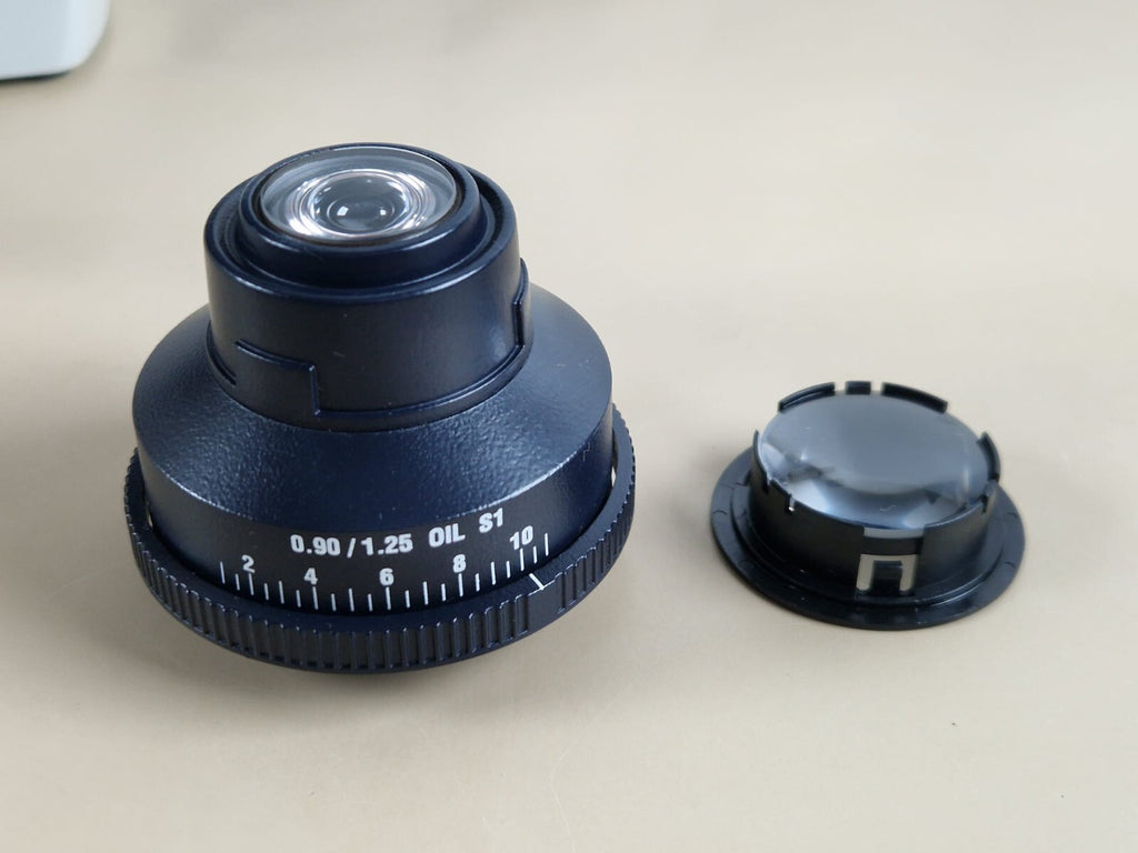leica DMLS microscope with 3 plan apochromat + 1x fluotar objective12