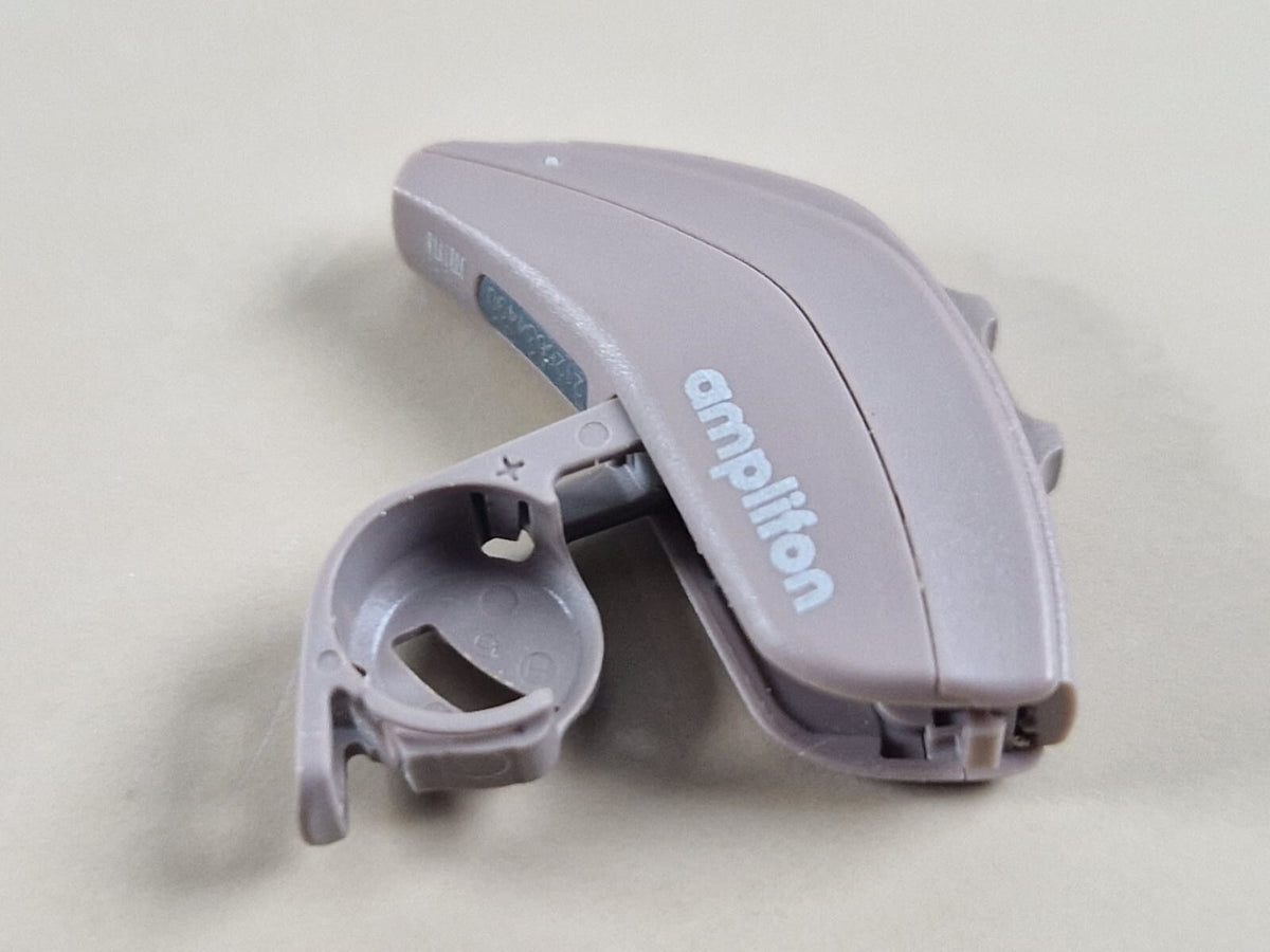 amplifon hearing aid ampli mini model: R1 X2 312 sn: 21266344900