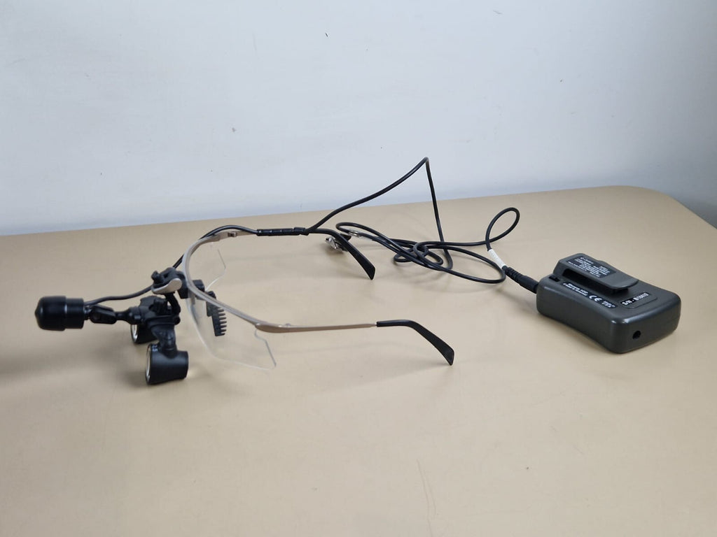 Q optics headlight   power adapter   refurb battery   frame   M 2.5X loupe9