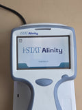 Abbott i-STAT Alinity handheld blood analyzer powered on startup screen