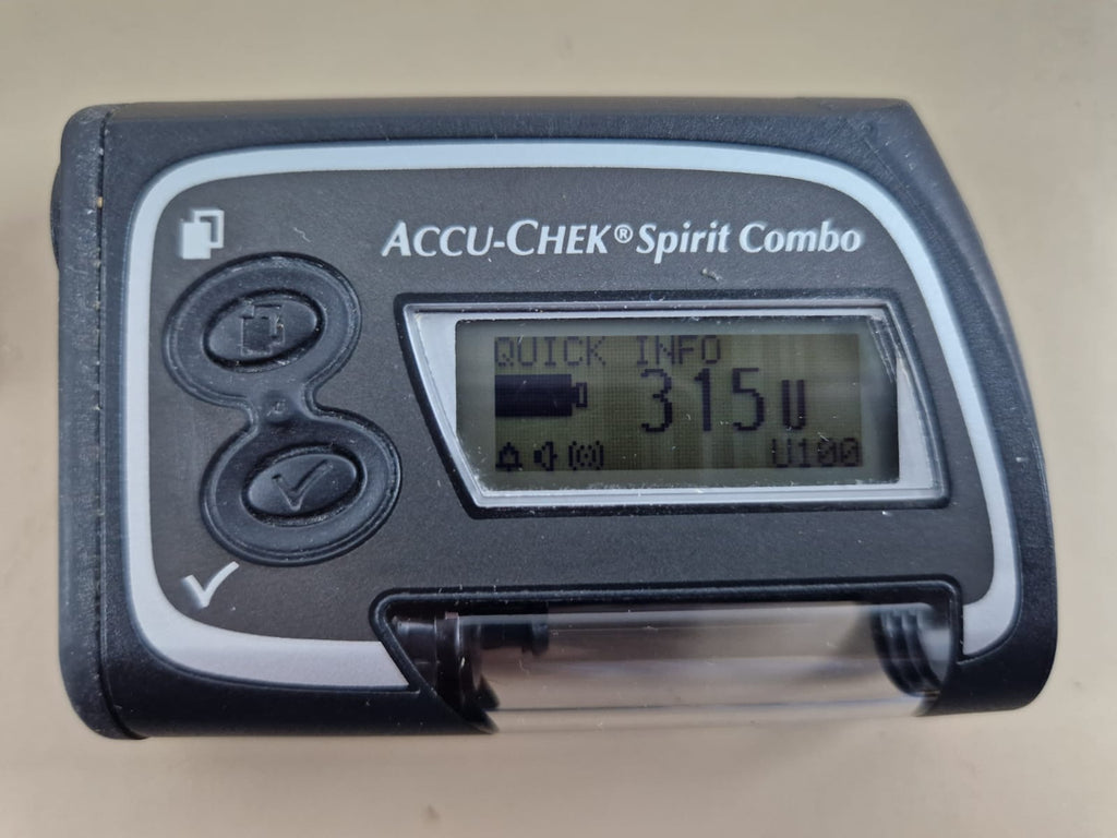 Accu-Chek Spirit Combo insulin pump front view showing quick info display