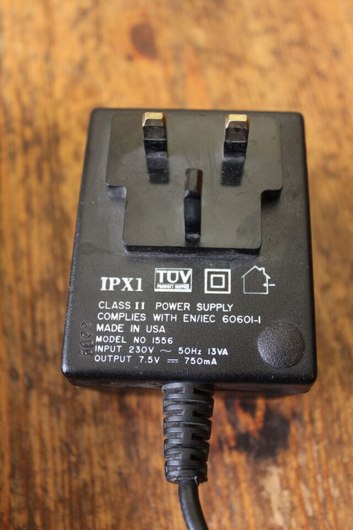 Alaris IVAC 1556 power supply label 230V input 7.5V 750mA output