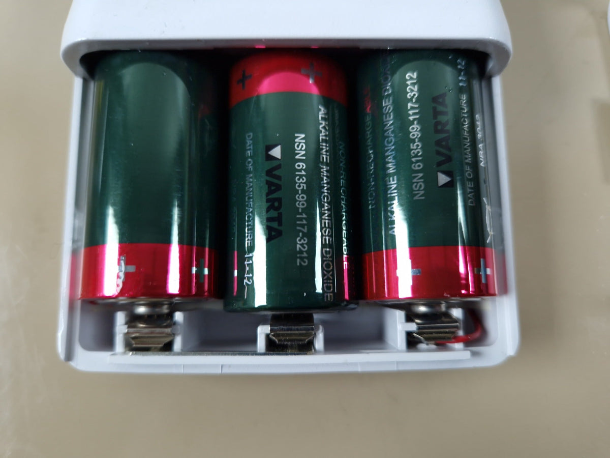 BCI 3301 battery compartment showing three C-size cells
