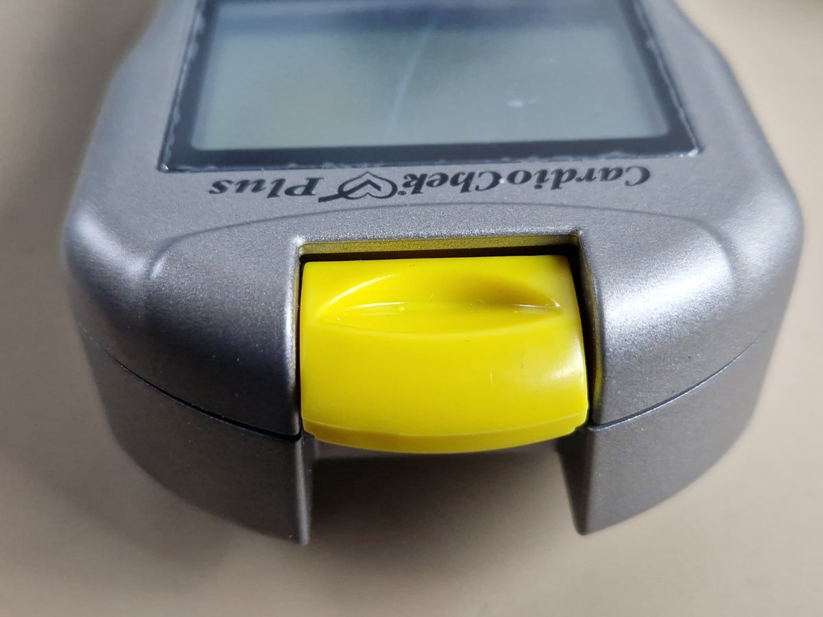 CardioChek Plus analyzer yellow test strip holder and front detail