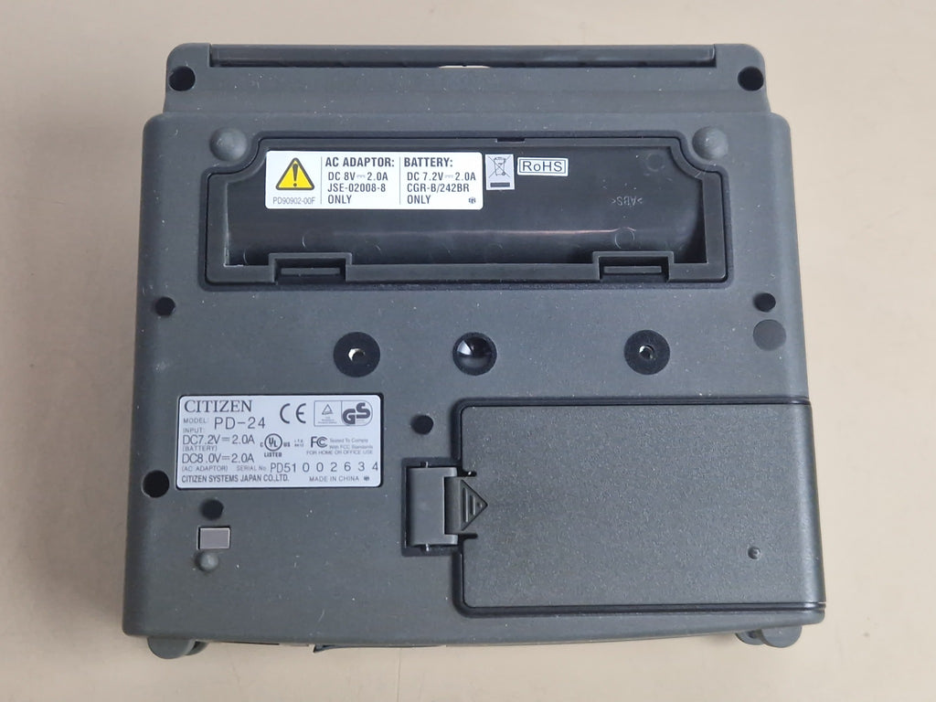 Citizen PD-24 bottom identification label and battery compartment