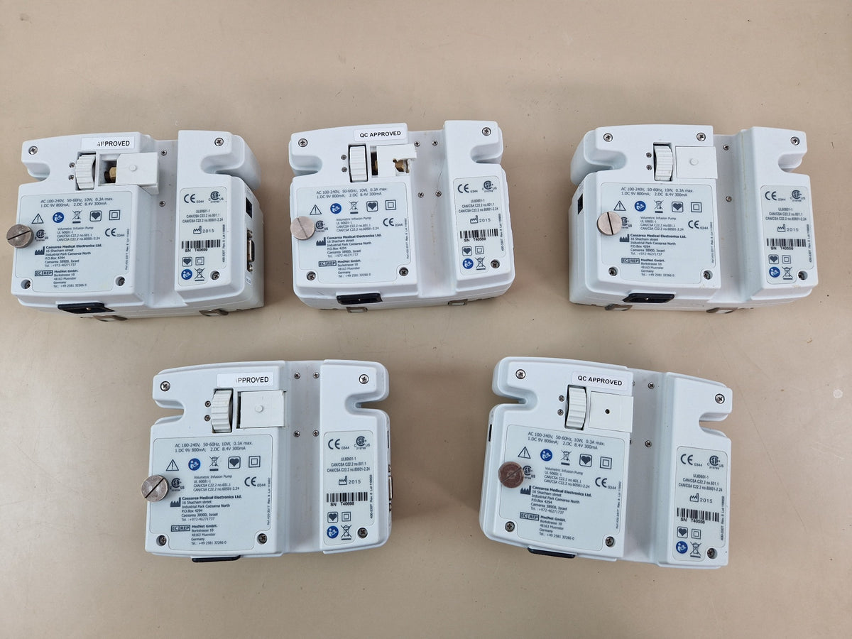 Five CME BodyGuard 121 Twins infusion pumps rear labels and serial numbers