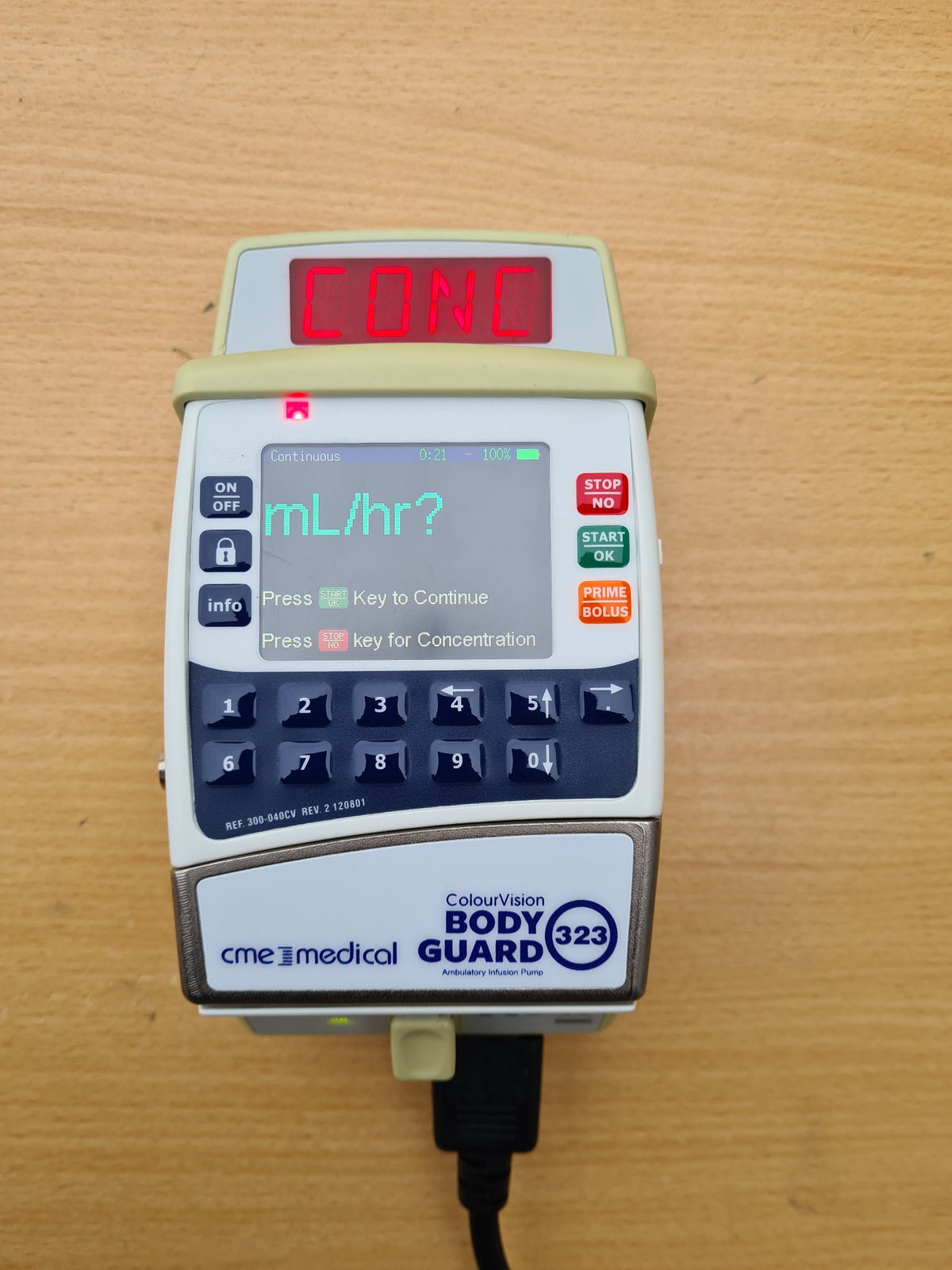 CME Medical ColourVision BodyGuard 323 colour screen infusion pump powered on in charger
