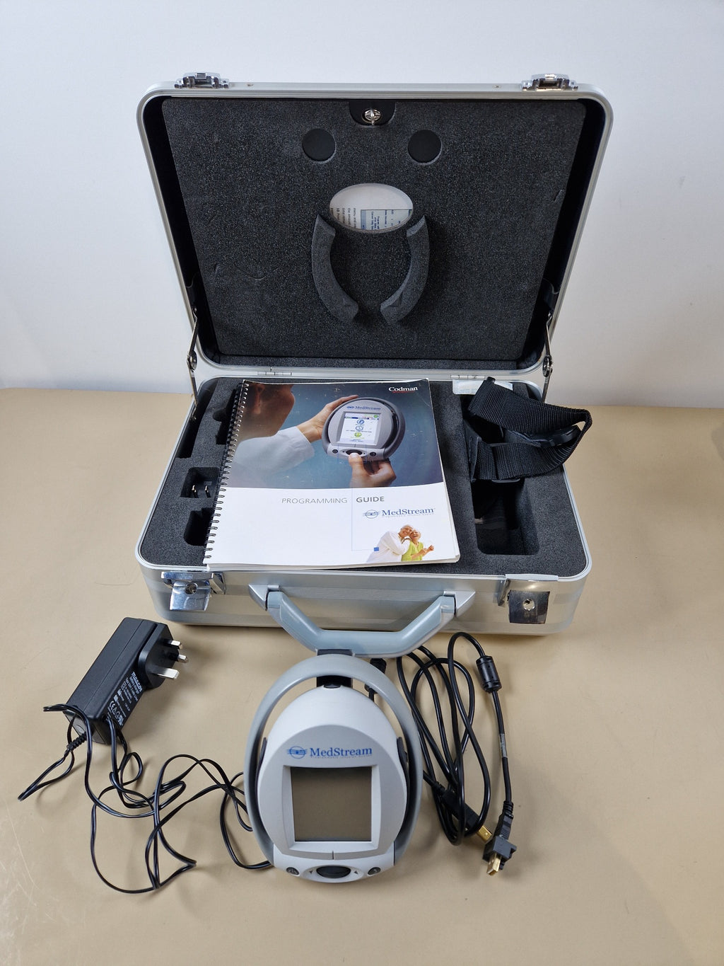Codman MedStream programmer with programming guide, power supply, cables and transport case