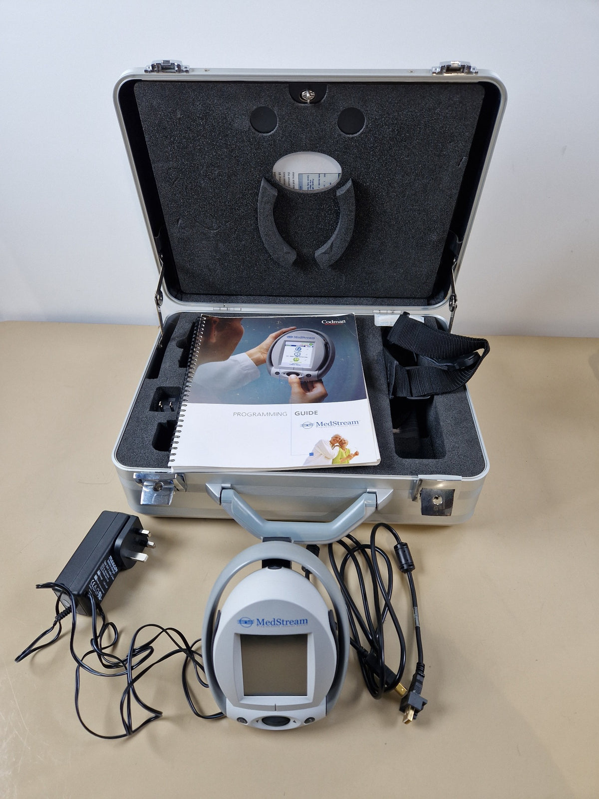 Codman MedStream programmer with programming guide, power supply, cables and transport case