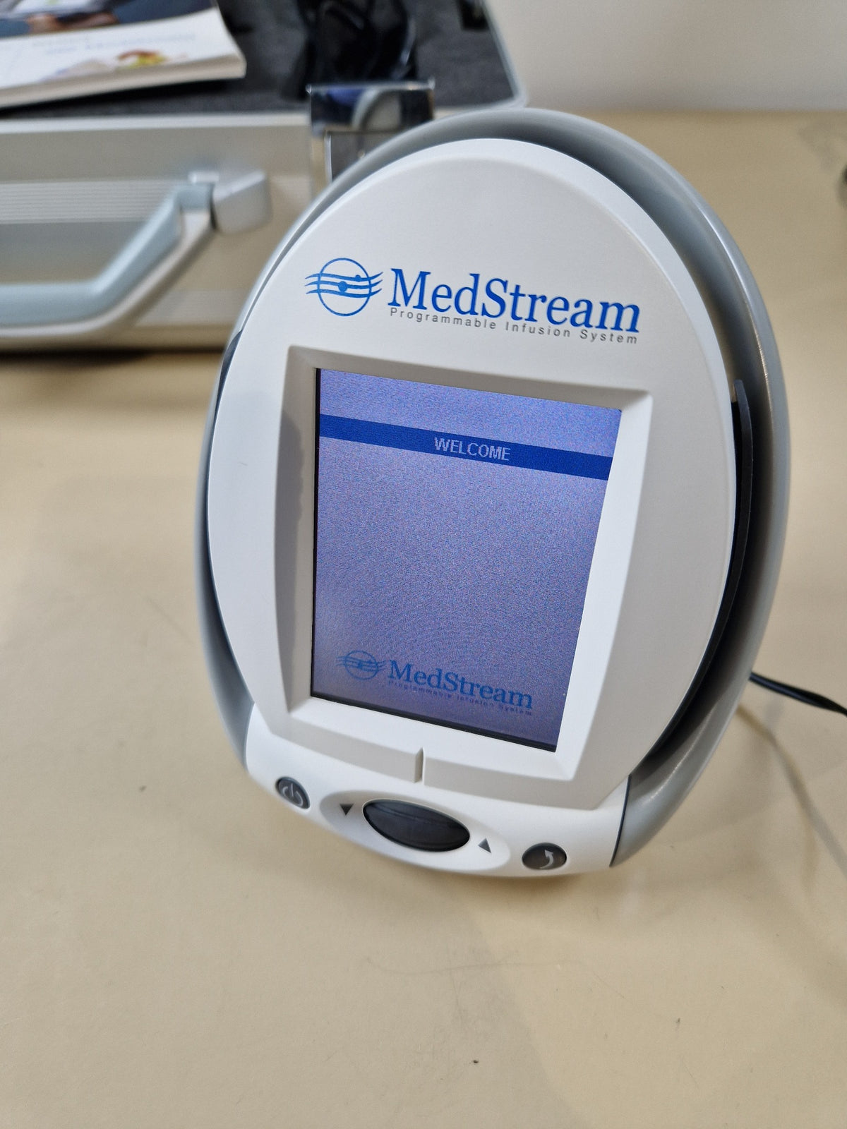 Codman MedStream programmable infusion system programmer powered on to welcome screen