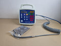 Criticare VitalCare ComfortCuff 506DN3 vital signs monitor front view with cuff