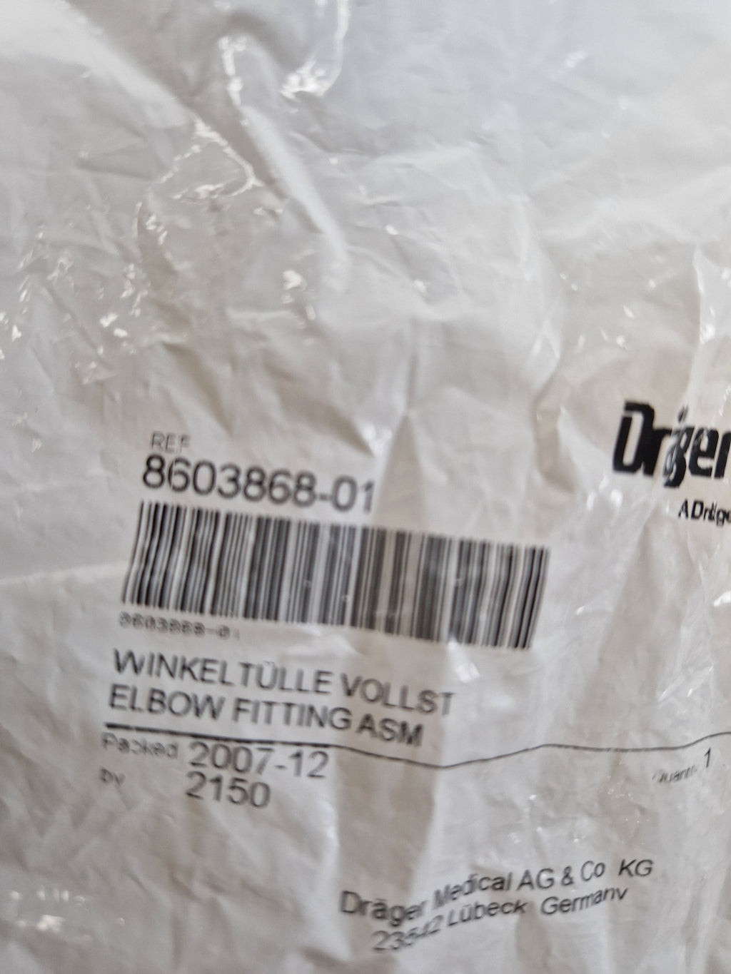 Drager 8603868-01 Elbow Fitting ASM reference label close-up