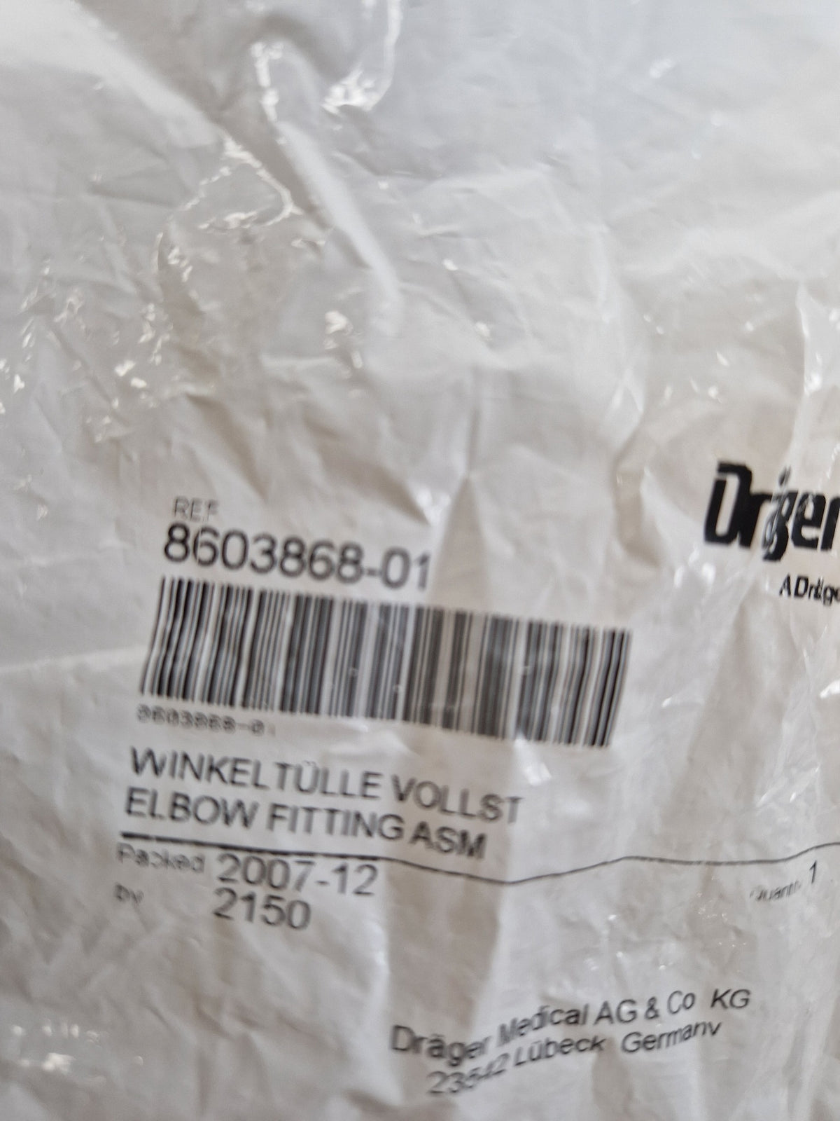 Drager 8603868-01 Elbow Fitting ASM reference label close-up