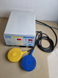ERBE ICC 200 electrosurgical generator with yellow and blue footswitches