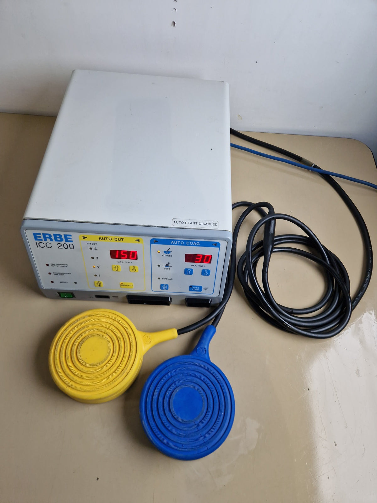 ERBE ICC 200 electrosurgical generator with yellow and blue footswitches