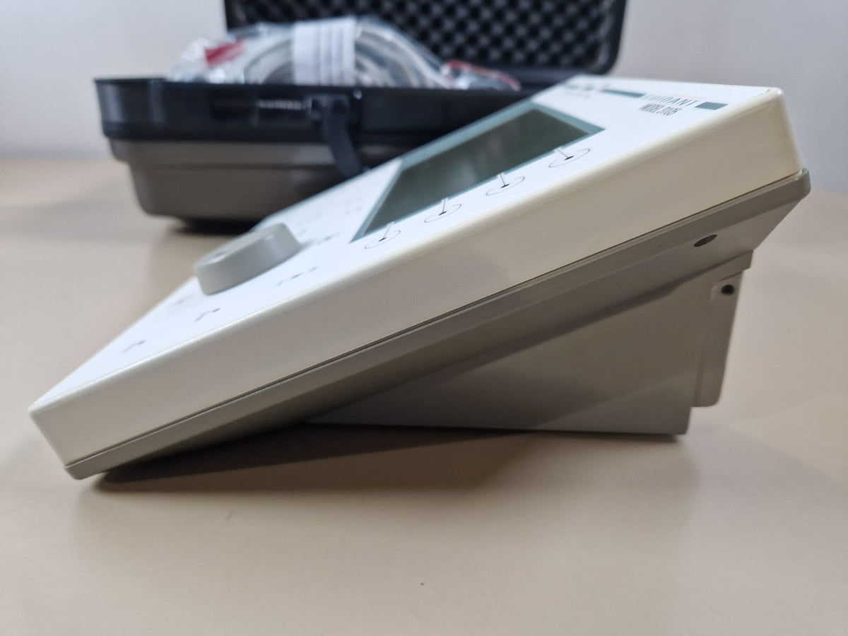 Side profile of Guidant 3105 pacing system analyser showing sloping control panel