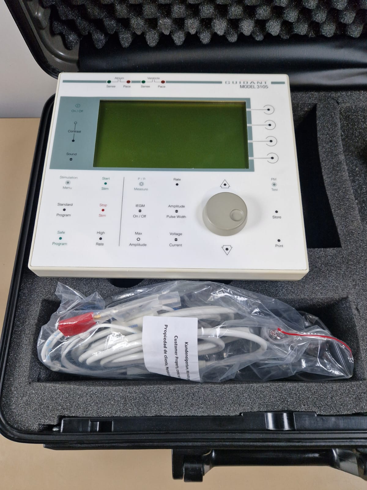 Guidant Model 3105 pacing system analyser in foam-lined carry case with photographed cables