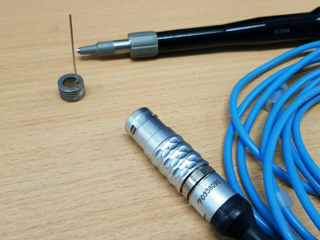 Close-up of the Gyrus ACMI handpiece connector showing reference 70338030