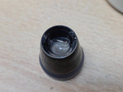 Haag-Streit CGIL iridectomy contact lens and storage container