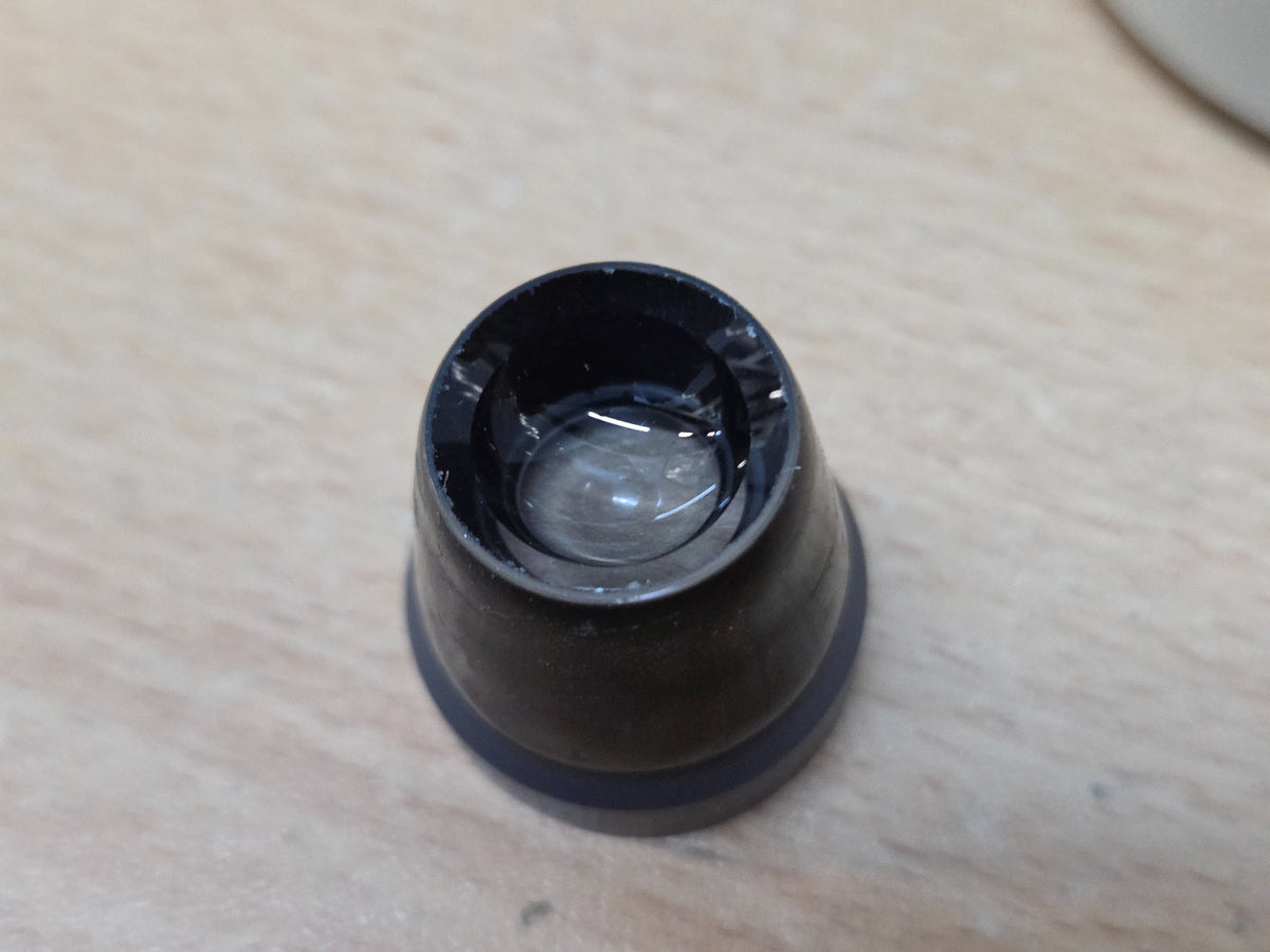 Haag-Streit CGIL iridectomy contact lens and storage container