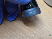 Haag-Streit CGIL iridectomy contact lens and storage container