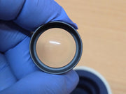 Haag-Streit CGIL iridectomy contact lens and storage container