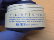 Haag-Streit CGIL iridectomy contact lens and storage container