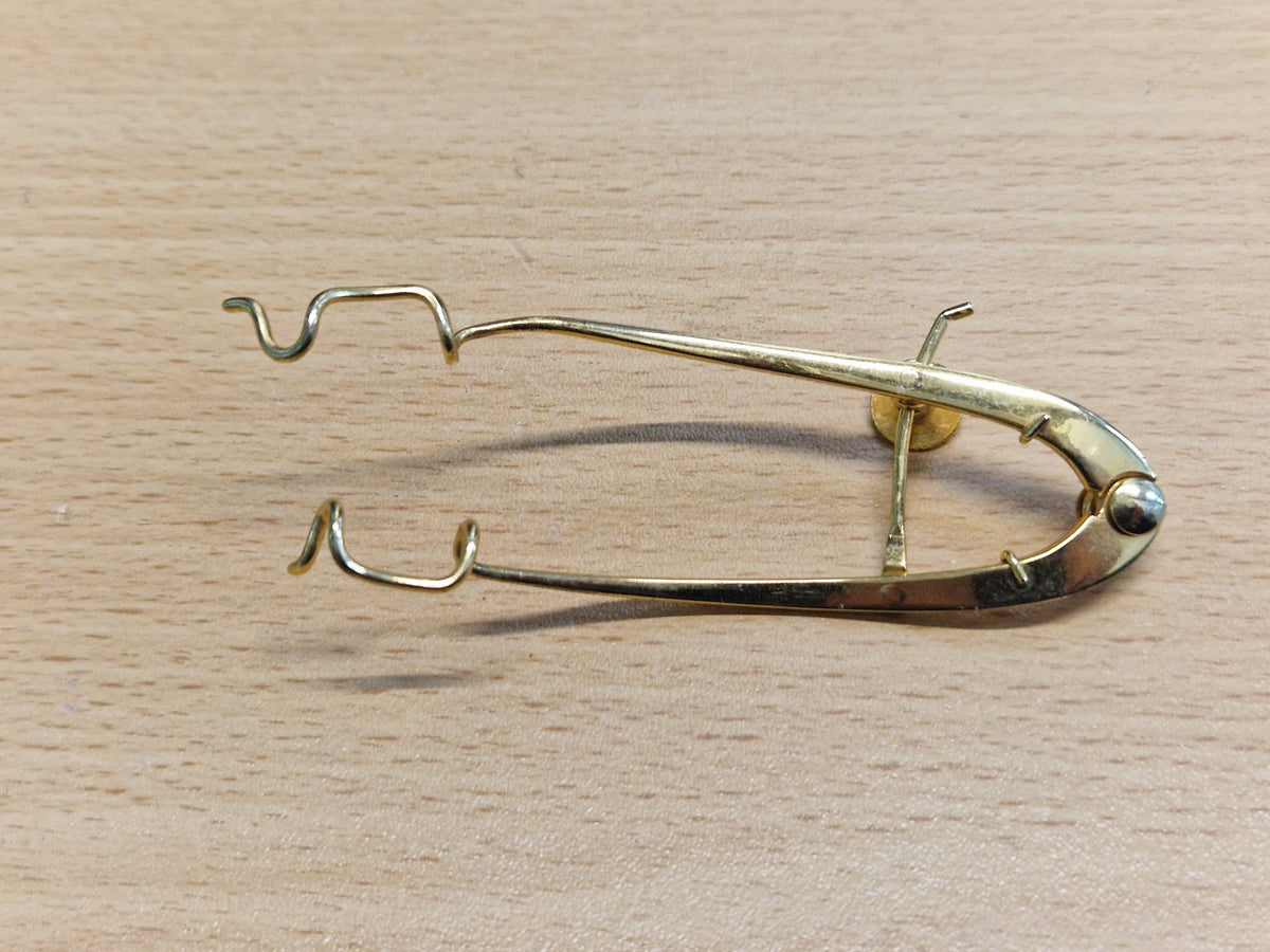 Reverse view of Keeler London adjustable wire lid speculum ophthalmic surgical instrument
