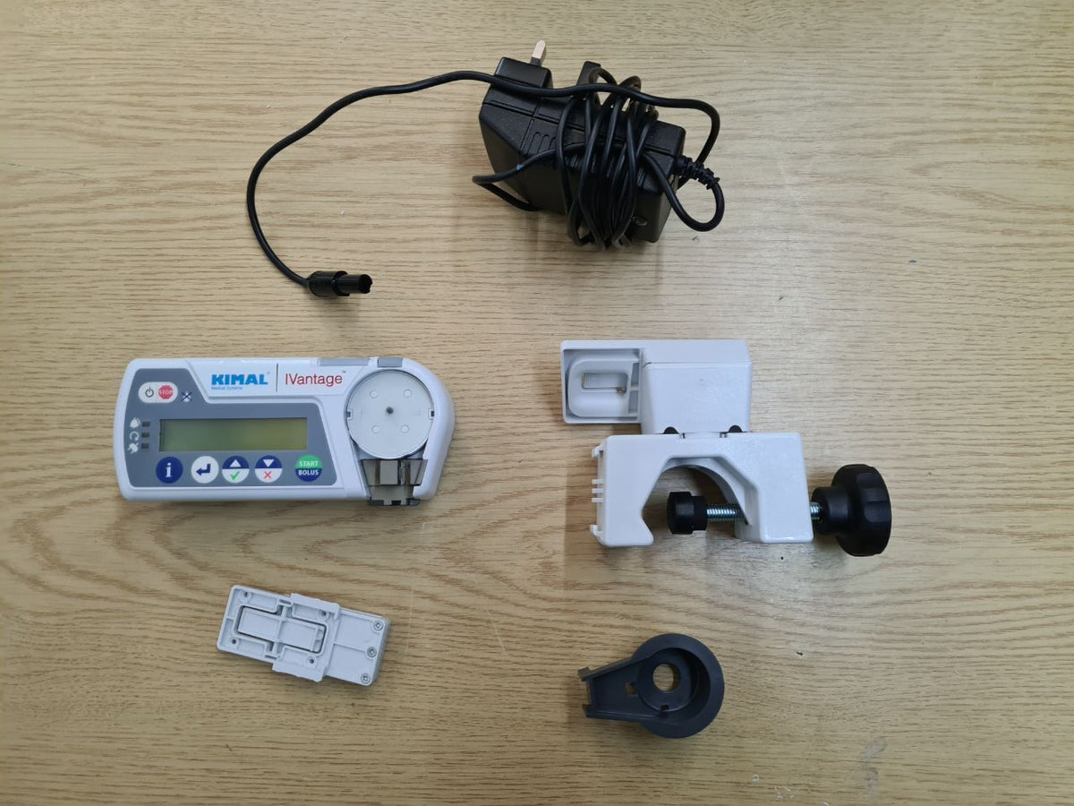 Kimal iVantage infusion pump with pole clamp power adapter and carry case