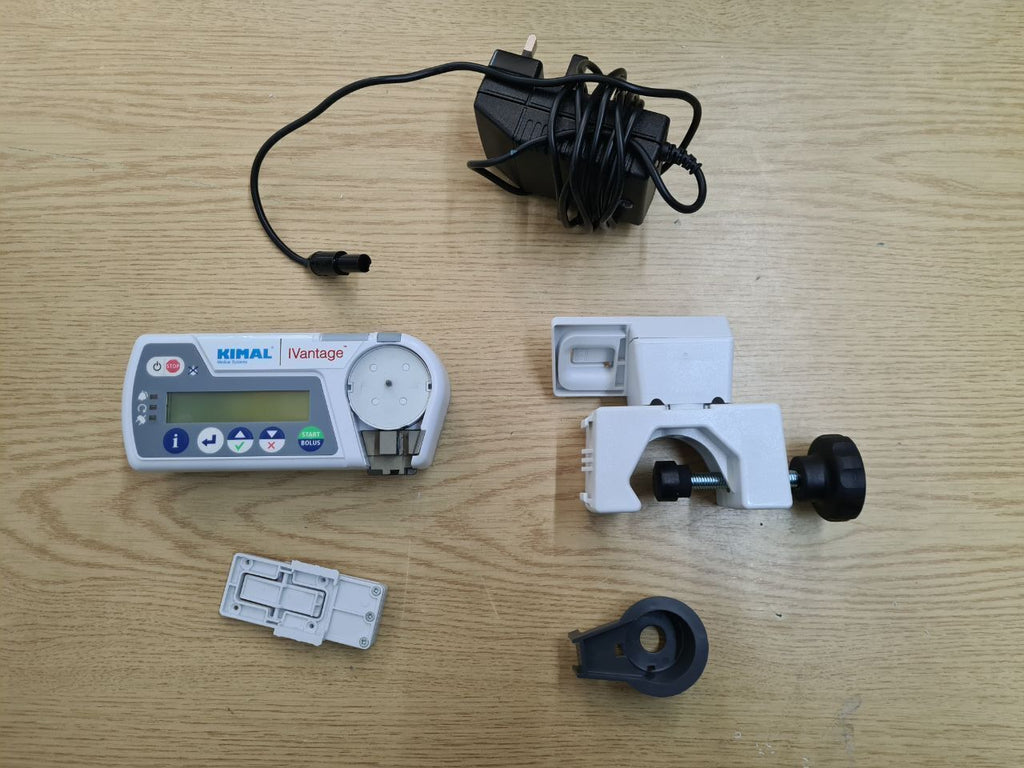 Kimal iVantage infusion pump with pole clamp power adapter and carry case