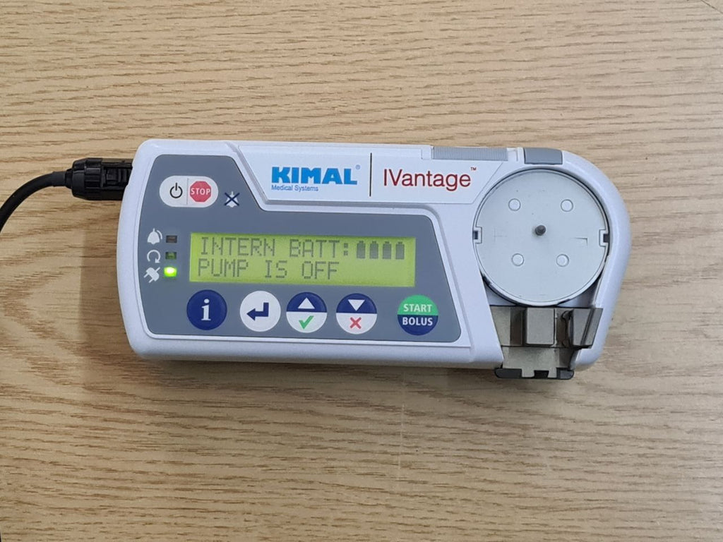Kimal iVantage infusion pump with pole clamp power adapter and carry case