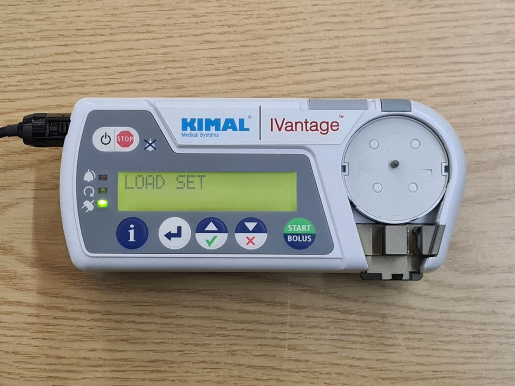 Kimal iVantage infusion pump with pole clamp power adapter and carry case