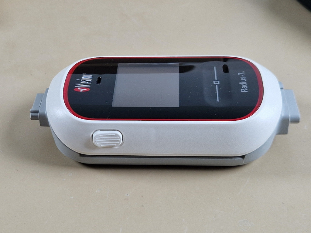 Masimo Radius-7 side view showing release button