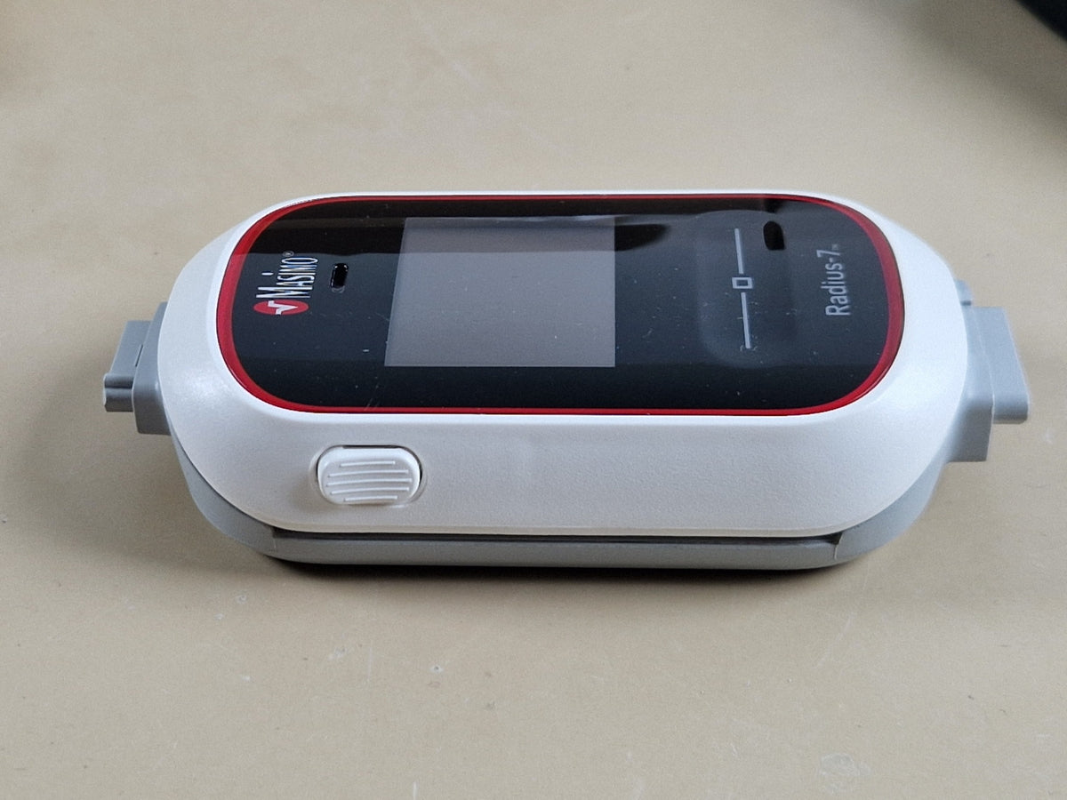 Masimo Radius-7 side view showing release button