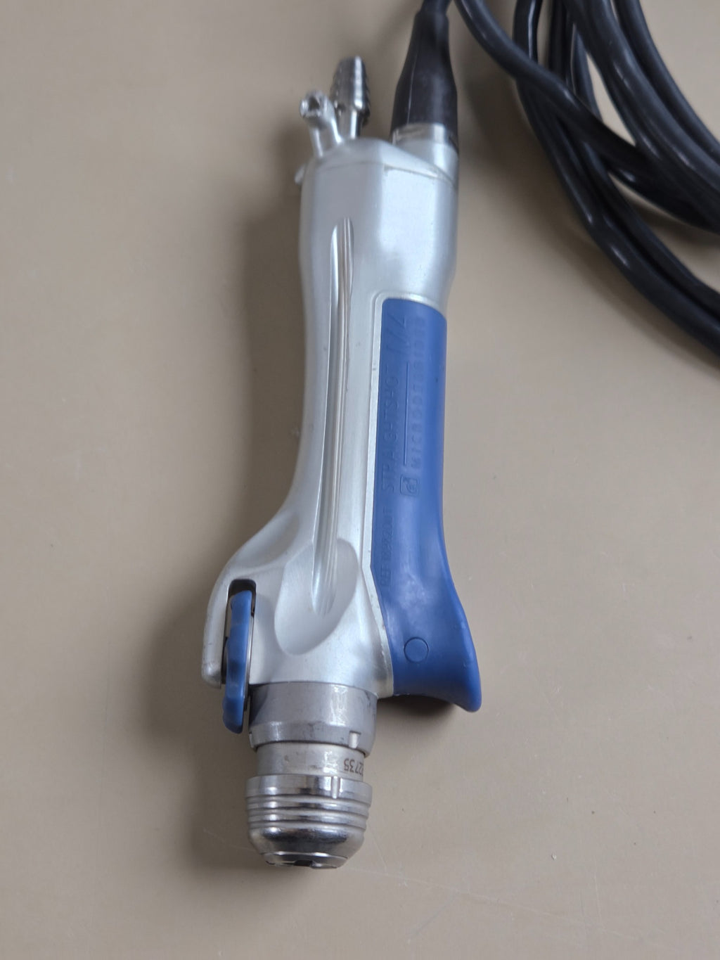 Medtronic M4 handpiece — original detail photograph