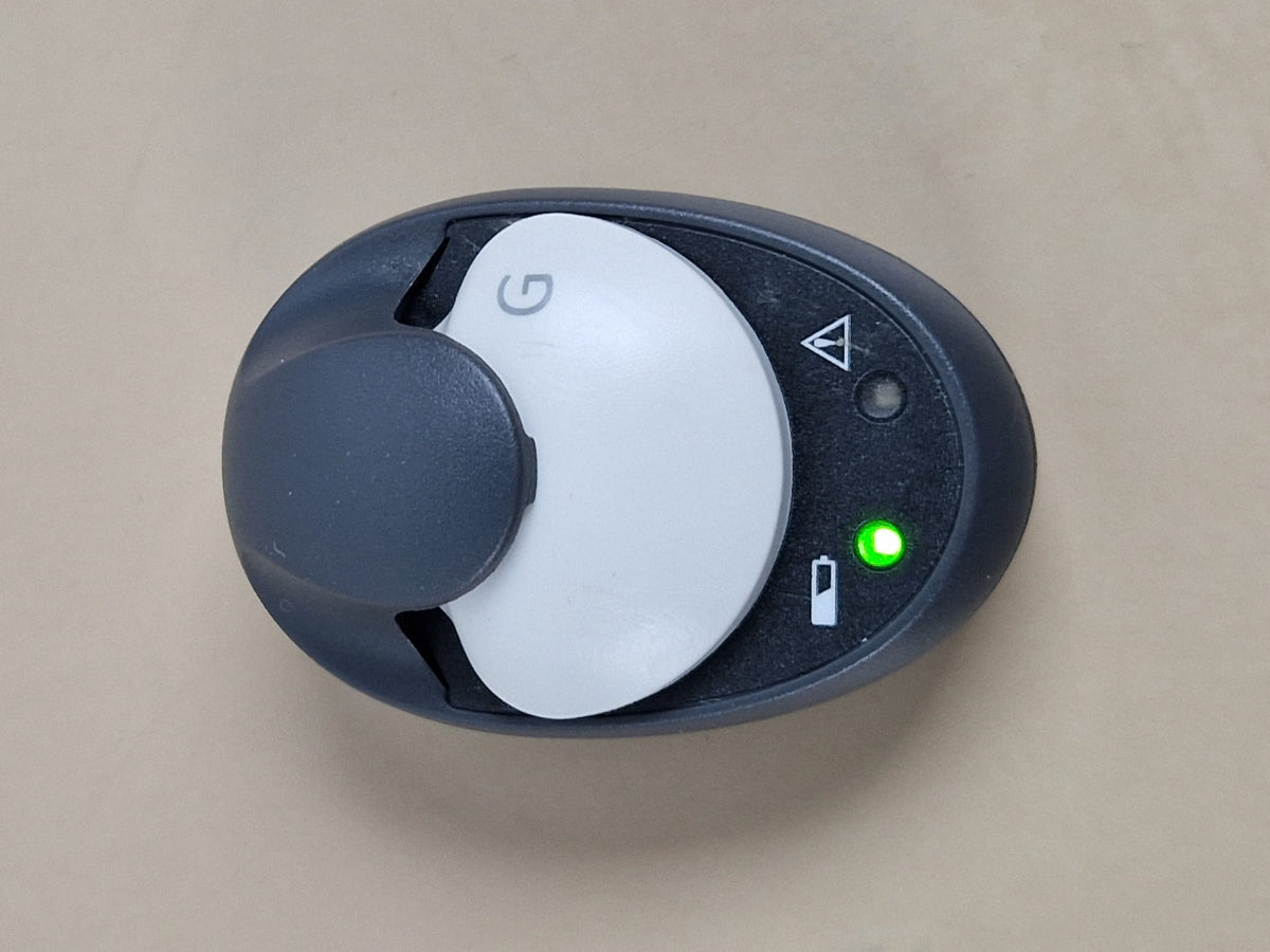 Medtronic MMT-7715 charger with green indicator — charger only; transmitter not included
