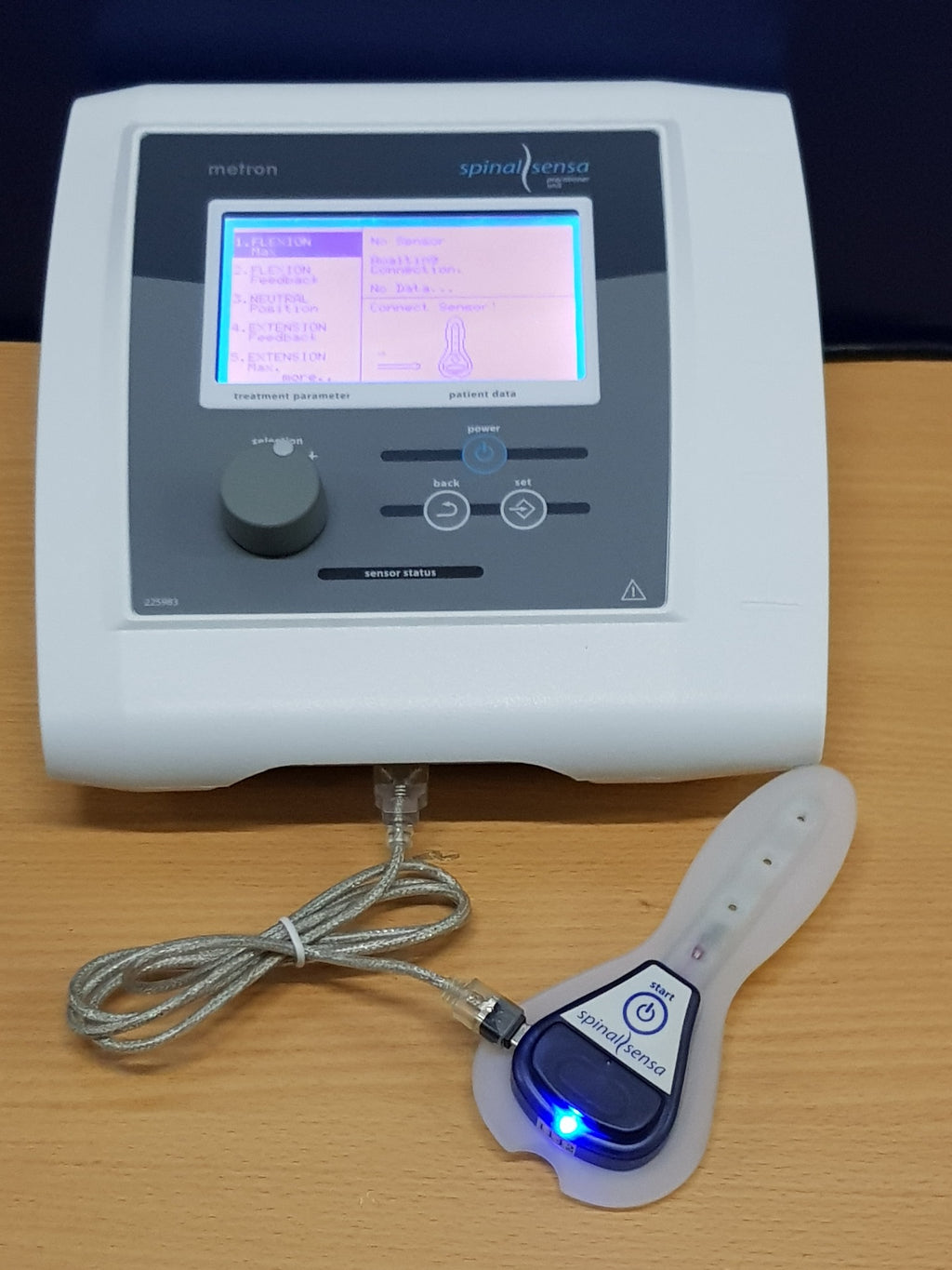 Metron Spinal Sensa patient sensor powered with blue status light