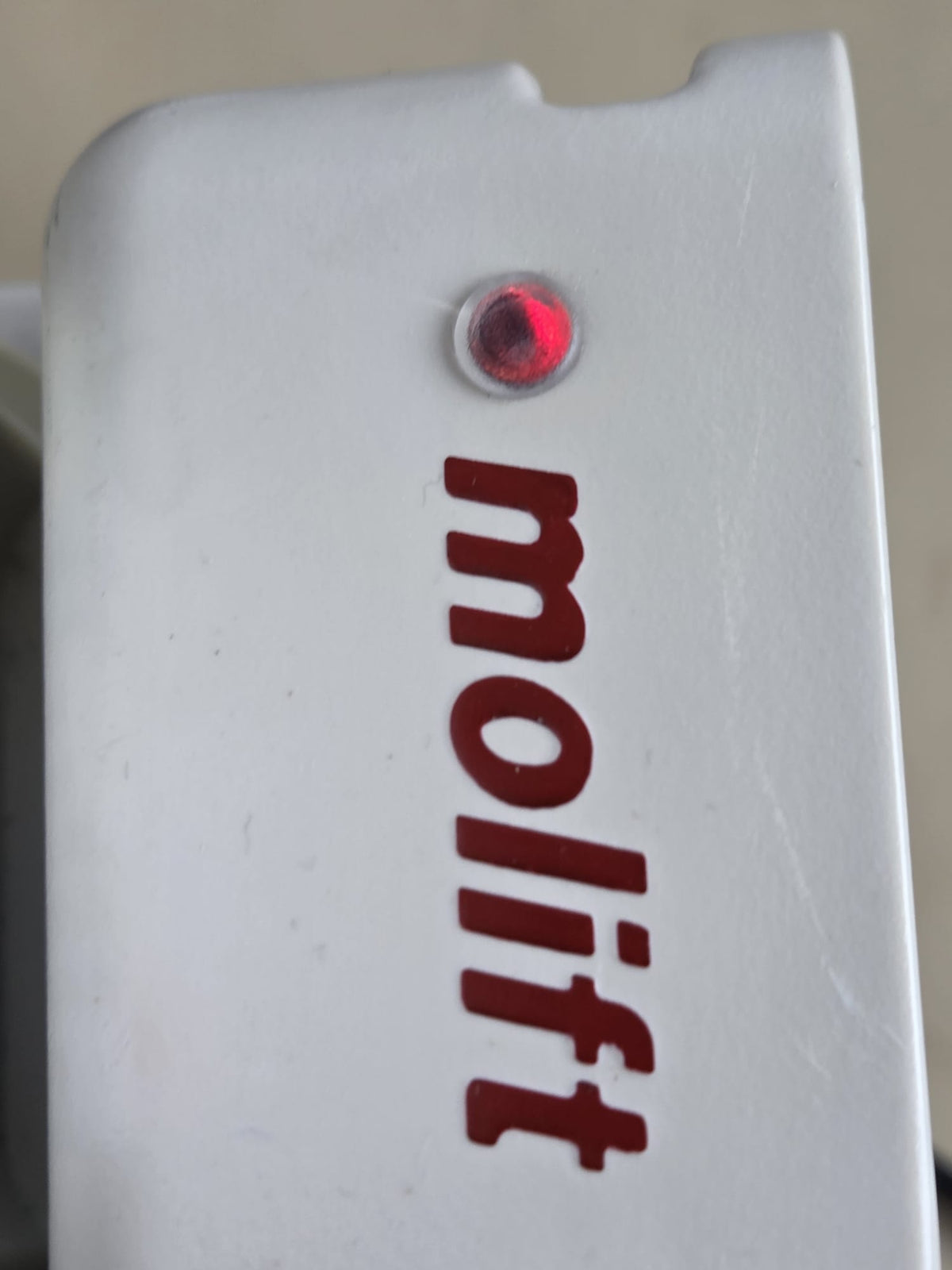 Molift 1340100 charger powered with red charging indicator illuminated