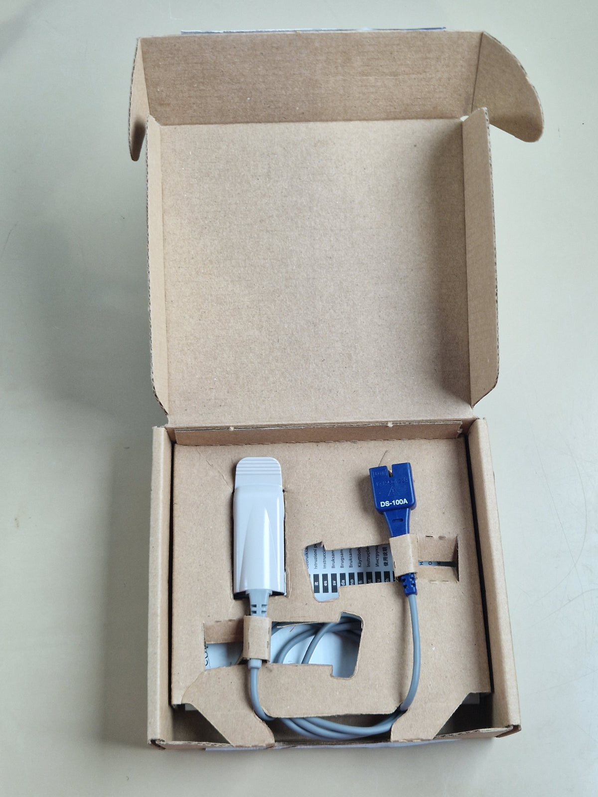 Nellcor DS-100A SpO2 sensor and trunk cable in box