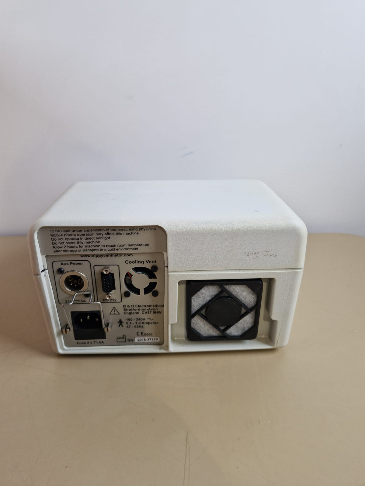 NIPPY 3+ rear panel showing mains inlet, auxiliary power socket, RS232 port, air filter and manufacturer label
