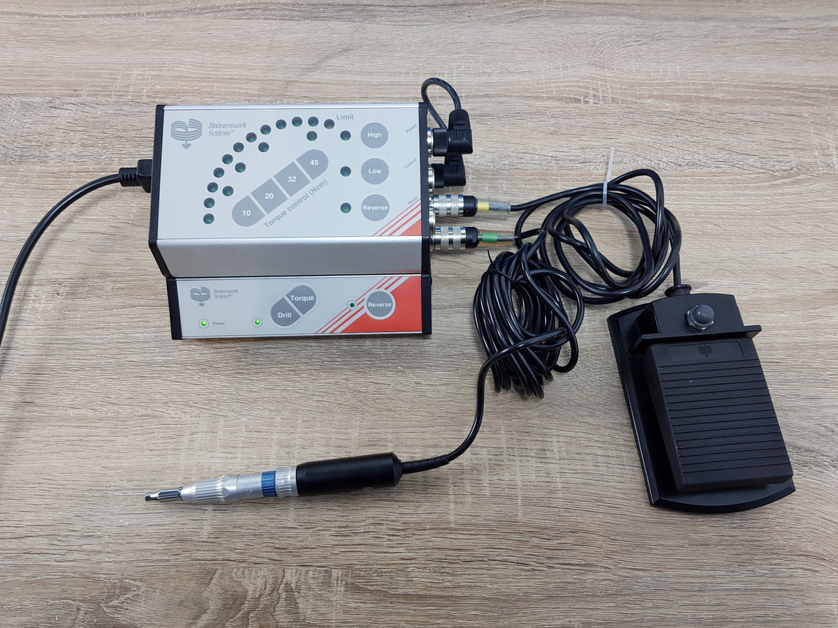 Nobel Biocare Branemark System controllers with motor handpiece and foot pedal