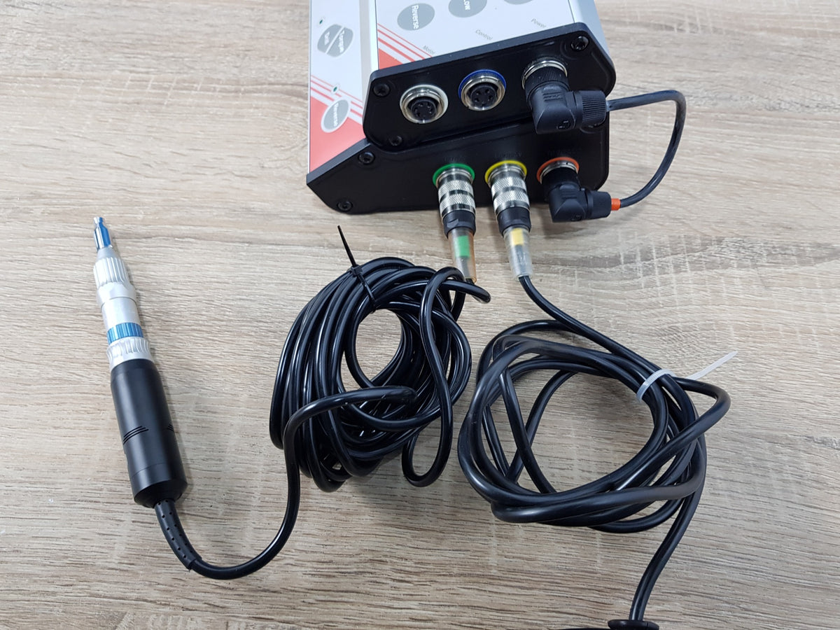 Close-up of Nobel Biocare Branemark controller connections and motor handpiece cable