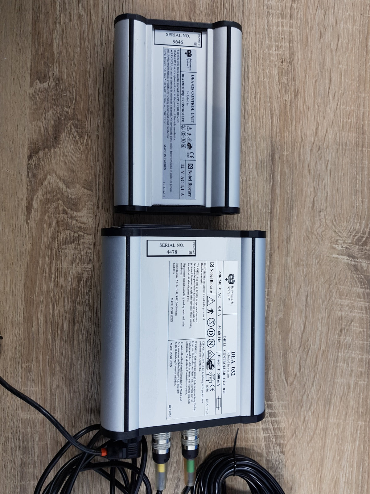Rear labels of Nobel Biocare Branemark DEA 028 torque controller and drill control unit