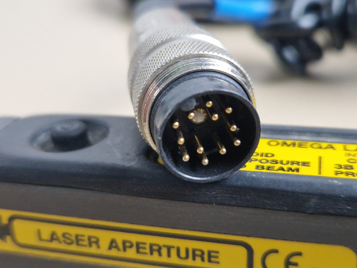 Omega Laser Systems probe connector pins close-up
