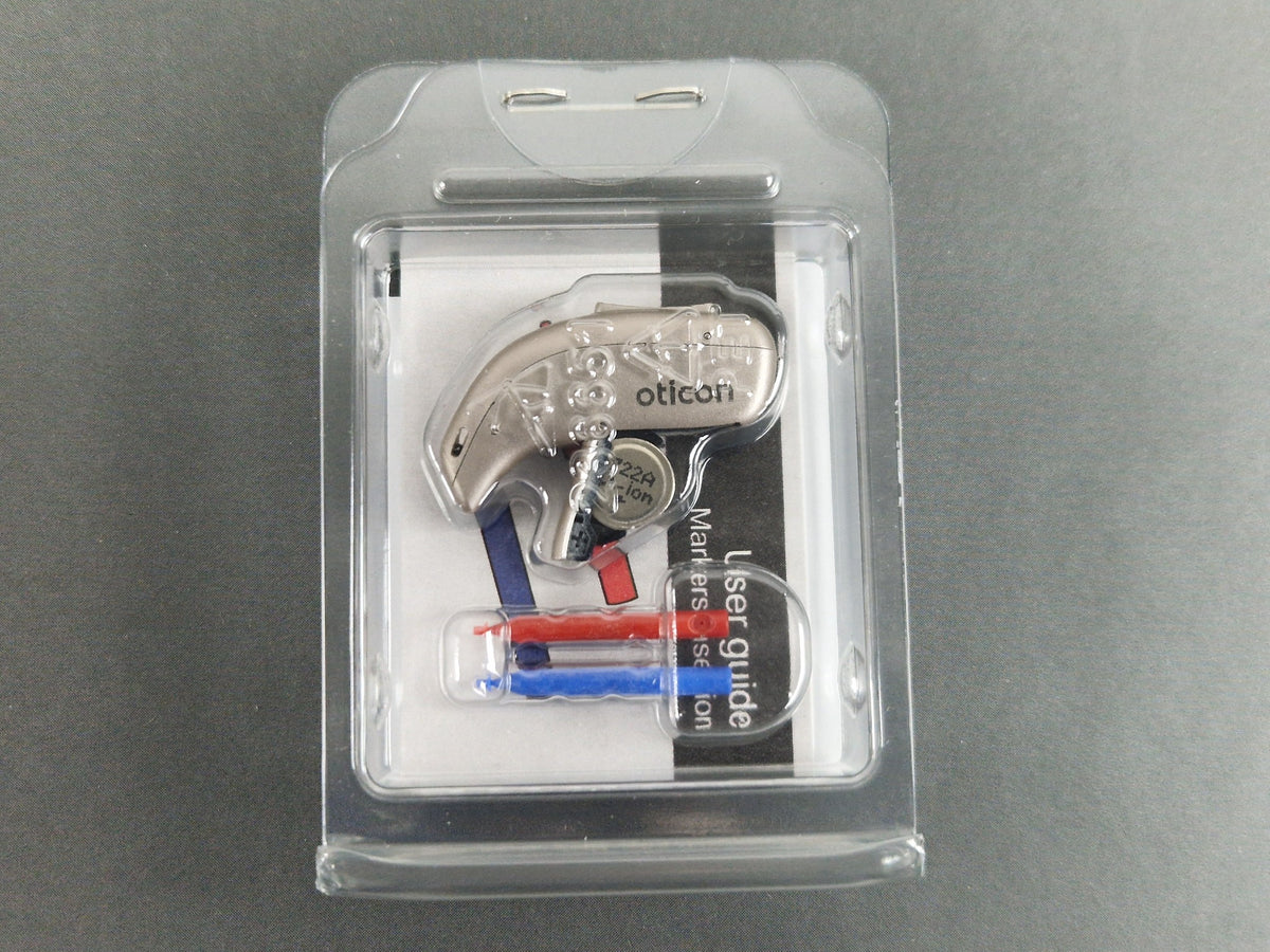 Oticon Real 2 miniRITE R hearing aid and accessories in clear pack