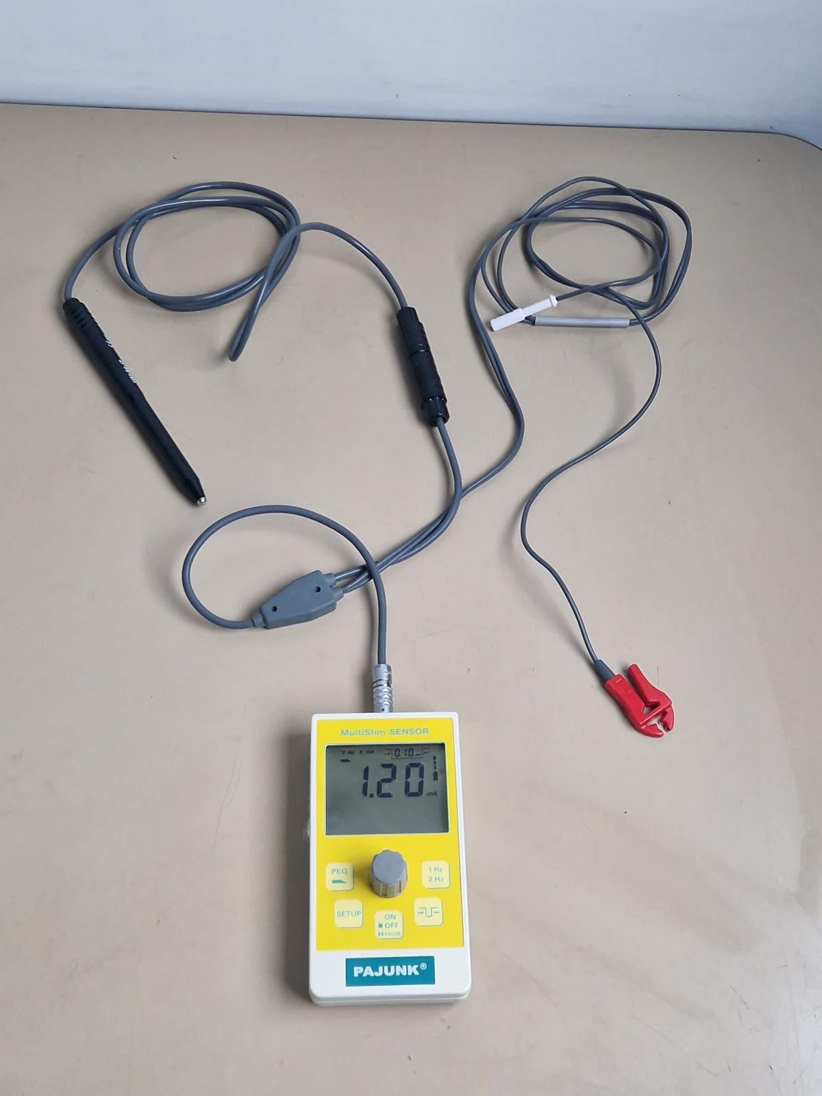 PAJUNK MultiStim SENSOR nerve stimulator with monopolar stimulation handle and patient cable powered on