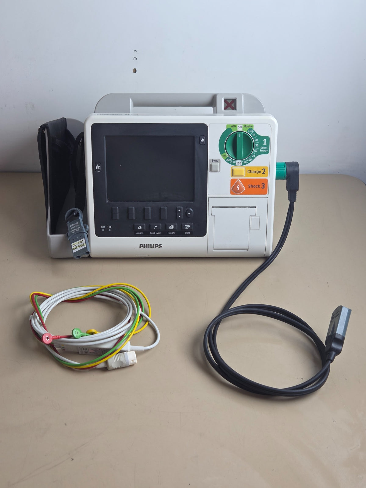 Philips HeartStart XL+ defibrillator monitor with therapy cable and 3-lead ECG cable
