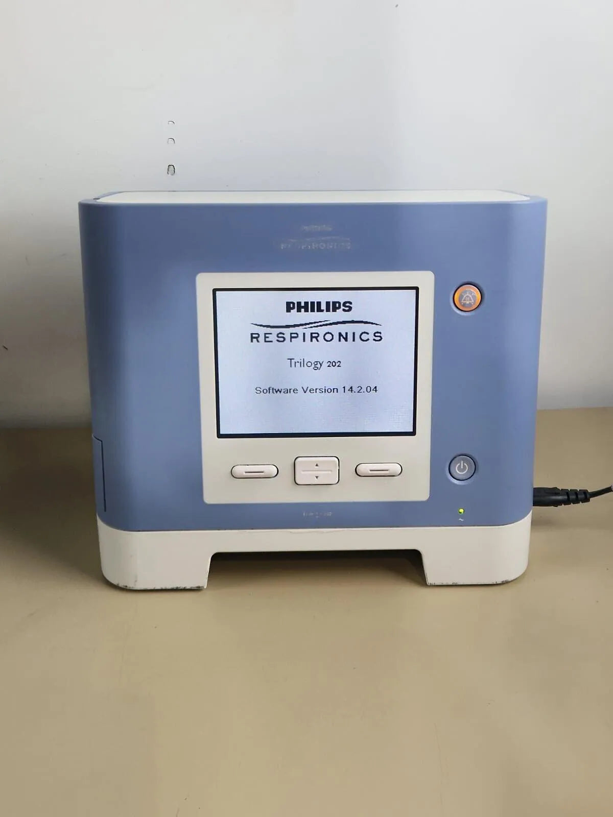 Philips Respironics Trilogy 202 ventilator front view, software version 14.2.04