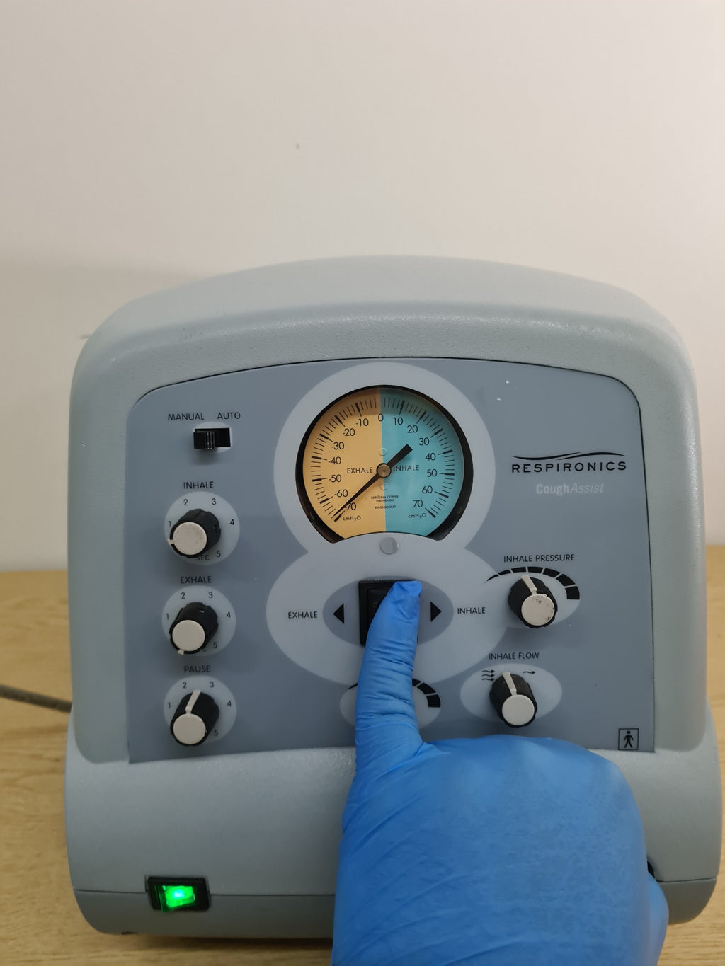Respironics CoughAssist CA-3200 powered on with manual inhale exhale control
